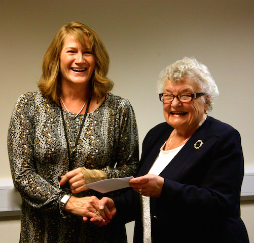 Former Mayor, Ronnie Murphy, presents Tracey Wright of WAAS with a cheque